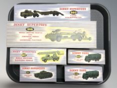 A group of reproduction Dinky Toys and Dinky Supertoys die cast scale military vehicles, with boxes,
