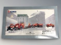 A Corgi Classics heavy haulage 31009 Wynn's Diamond T Ballast 24 wheel girder trailer with boiler