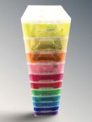 A plastic eleven drawer chest containing a large quantity of costume jewellery.