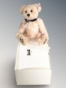 A modern Steiff mohair teddy bear, with tag, in box.