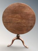 A George III mahogany snap top bird cage tripod occasional table,