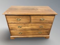 A reproduction camphor wood four drawer chest in the Victorian style, 115 cm x 59 cm x 80 cm.
