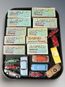 A group of reproduction Tri-Ang Spot-On die cast models in boxes, several further unboxed cars.