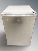 A Logik under bench/counter top fridge,