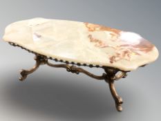 An onyx and gilt metal coffee table,