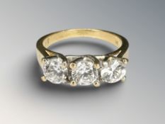 A 9ct yellow gold ring set with three zircon, size N/O CONDITION REPORT: 3.