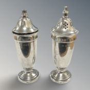 A pair of George VI silver sifters, Viners Ltd, Sheffield 1949, height 10.5cm.