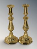A pair of brass octagonal based candlesticks, height 30 cm.