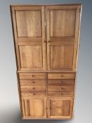 A Naver cabinet fitted with cupboards and drawers,