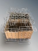 A quantity of modern bottle racks.