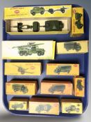 A group of reproduction Dinky die cast scale military vehicles, with boxes, as illustrated.