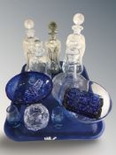 A group of Scandinavian dimple and ship's decanters, textured glass tealight holder,