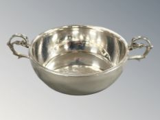 An Elizabeth II silver wine tasting cup, Kenneth Tyler Key, Birmingham 1963, width 14cm.