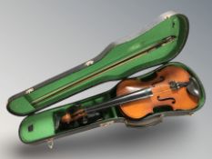 A Chinese violin, labelled within 'Copy from Antonius Stradivarius', with two piece 14