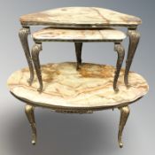 An onyx and gilt metal oval coffee table,