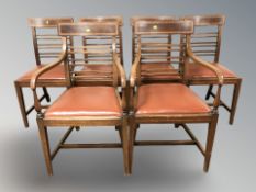 A set of six mahogany and satinwood inlaid dining chairs,