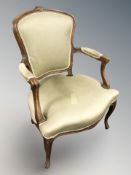 A continental carved beech salon chair.