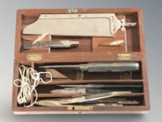 A mahogany cased surgical set.