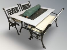 A wood and metal frame garden table, 145 cm x 90 cm,