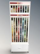 A Gütermann Creativ thread spool display stand, fitted a drawer beneath,