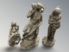 Three Heredities figures, tallest 33 cm.