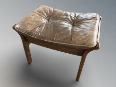 A Danish bentwood and stitched leather footstool, width 60 cm.