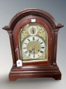 A reproduction mahogany quarter chiming bracket clock, the movement signed Gustav Becker,