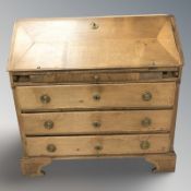 A continental oak all front bureau, 111 cm W x 55 cm D x 108 cm H.