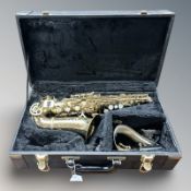 A Yoshina Alto saxophone in case,