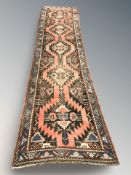 An antique Karabagh runner, South Caucasus, 420 cm x 103 cm.