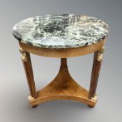 A French Empire-style walnut, gilt metal mounted and green marble gueridon table,