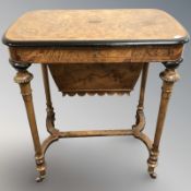 A Victorian amboyna, ebonised and satinwood inlaid work table, 64 cm x 41 cm x 72 cm.