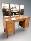 A teak mirror backed dressing table,