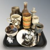 A group of Scandinavian studio pottery items including vases, jug, figure of an owl, etc.