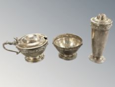 An Elizabeth II silver Lindisfarne pattern cruet set, B S Ltd, Birmingham 1968.