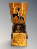 Three wooden panels,