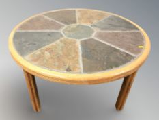 A Danish Haslev teak tiled topped circular coffee table,