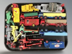 A group of reproduction Dinky and Dinky Supertoys die cast flatbed wagons, delivery vans,