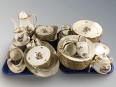 Seventy four pieces of KPM gilt porcelain tea and dinner wares.
