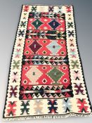 A Caucasian flatweave kilim, 197 cm x 102 cm.