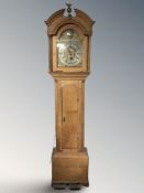 A 19th century oak eight day longcase clock, with pendulum, weights and keys, height 225 cm.