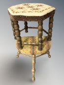A hexagonal tapestry footstool and a tripod stool