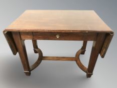 A continental mahogany drop end sofa table, width 103 cm unextended.