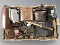 A group of vintage cameras including Halina, a Meopta Admira 8F camera, a small brass telescope,