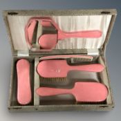 A 20th century pink plastic dressing table set in box