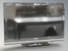 A Sony Bravia 40 inch LCD TV with lead and remote