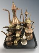 A group of Turkish copper plated coffee pots and ewers.