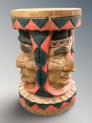 A carved and painted wooden plant stand or stool, height 41cm.