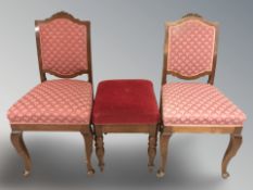 A pair of continental mahogany dining chairs and a stool.