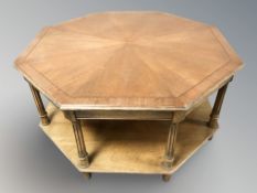 A reproduction mahogany octagonal two tier coffee table,